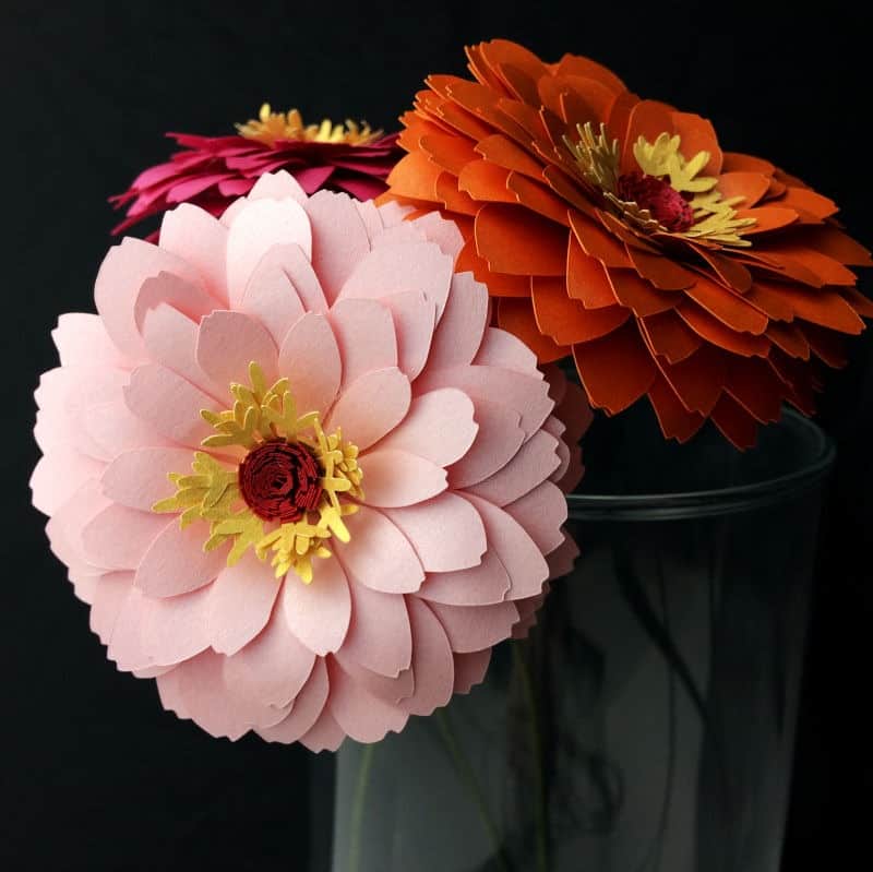 Learn how to make paper flowers. Paper zinnia | how to make paper flowers | diy paper flowers | wedding decorations | easy paper flowers | paper crafts | silhouette crafts | Cricut flowers