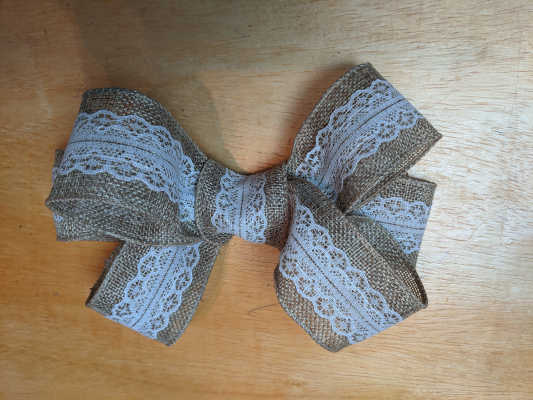 glue the ribbon on the middle of the wreath bow
