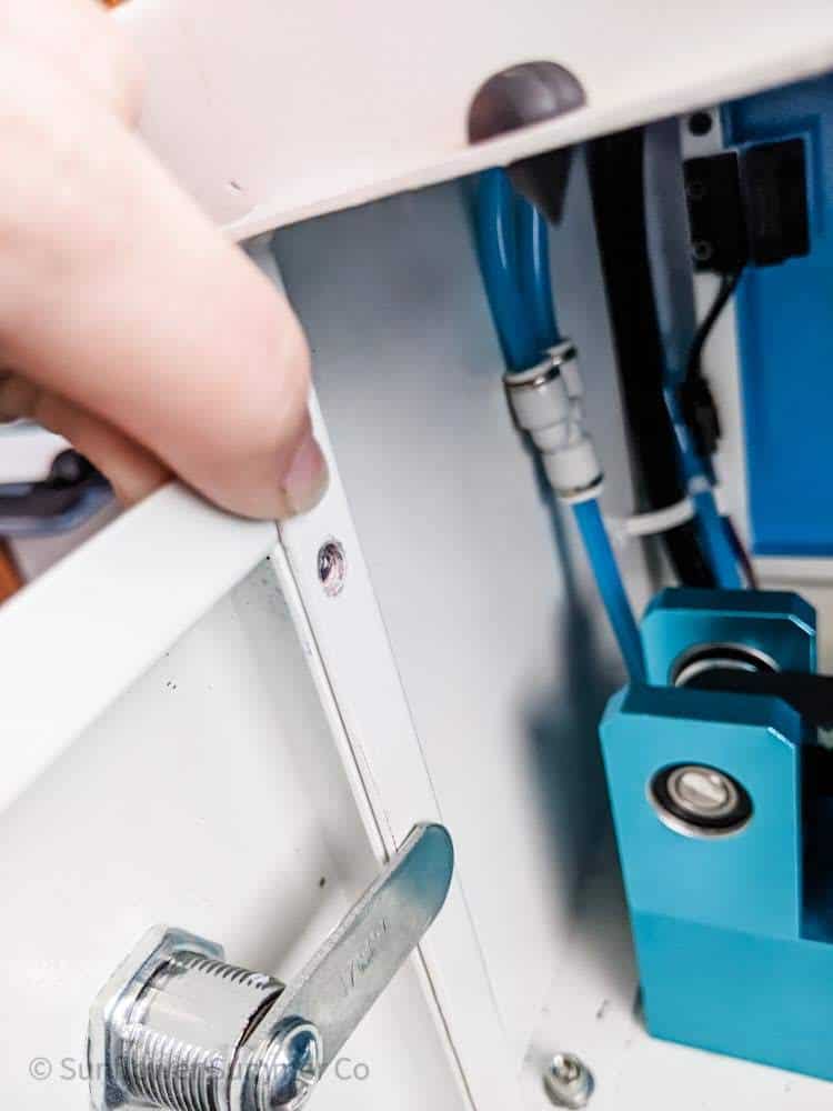 location of the bolt holding on the front panel on your thunder laser