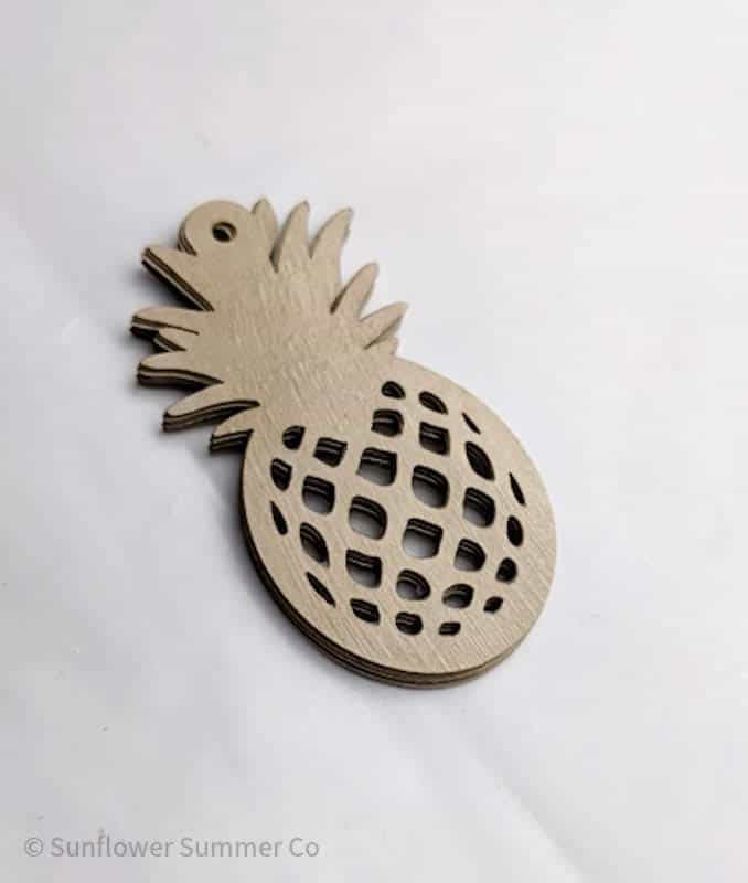 varnish added to laser cut paper earring