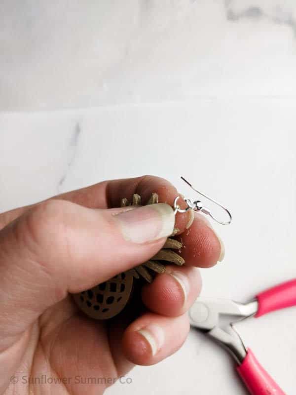 adding jump ring and hook to paper earrings