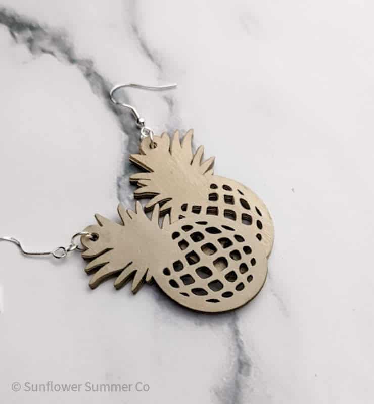 Paper pineapple earrings made with a cricut or laser